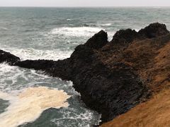 05B The sea hits the cliffs and protruding rocks of basalt columns in Arnarstapi Snaefellsnes Peninsula Iceland