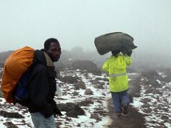03B My Guide And Porter Cook Hiking Along The Path With Some Snow Between Shira And Baranco Camps On Day 3 Of The Machame Route Climb Mount Kilimanjaro Kili October 2000