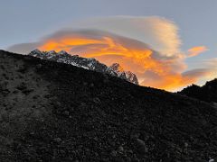 09A Orange lenticular cloud over Nuptse and Lhotse at sunrise from Lobuche East Base Camp 5170m