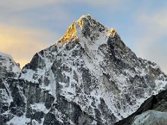 10A The first rays of sunrise on Ama Dablam from Lobuche East Base Camp 5170m