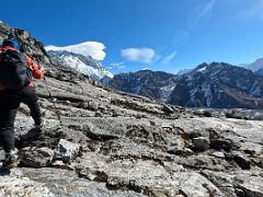 01C Climbing the rocky slabs with Nuptse and Baruntse beyond on the way to Lobuche East High Camp 5600m