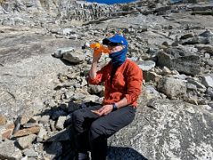 03C Taking a refreshment break on the rocky slabs on the way to Lobuche East High Camp 5600m