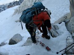 03 Guide Lal Sing Tamang puts on his crampons 30 minutes after leaving High Camp 5600m on Lobuche East Peak summit climb