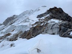 04A One last very large rock blocks the way to the snow slopes on Lobuche East Peak summit climb