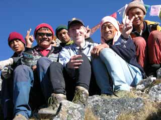 Jerome Ryan, Nepalese guide Gyan Tamang and our 4-person trekking crew at Sinion La on the Kangchenjunga trek