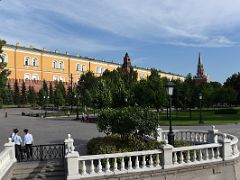 05B Looking across Alexander Gardens to the Kremlin wall with Middle Arsenalnaya Tower and Troitskaya Tower from Manege Square Moscow Russia