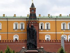 06A Middle Arsenalnaya Tower built in 1495 with Statue of Patriarch Hermogenes, grotto, obelisk in Alexander Gardens Kremlin wall Moscow Russia