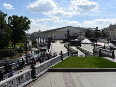 01A Manezhnaya Square with fountains, a waterway and Moscow Manege building with Alexander Gardens on the left Moscow Russia