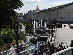 04A Alexander Gardens, the waterway with statues and fountains, Moscow Manege building in Manezhnaya Square Moscow Russia