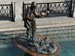04C A sculpture in the waterway is a monument to the fisherman and fish by Zurab Tsereteli 1996 in Manezhnaya Square Moscow Russia