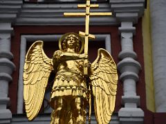 06B Statue of a golden angel holding an orthodox cross above the dome of Iveron chapel at Resurrection Gate Manezhnaya Square Moscow Russia