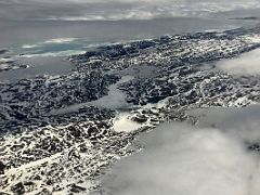 05B Flying Over The Icy And Barren Landscape Of Baffin Island On Flight From Ottawa To Iqaluit Baffin Island Nunavut Canada For Floe Edge Adventure
