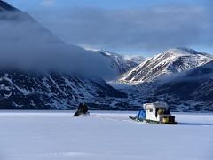 05C Our Qamutiik Sleds With Sunny Rocky Bylot Island Coast On Our Floe Edge Adventure Nunavut Canada