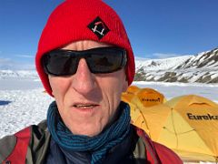 02D Jerome Ryan Enjoys The Early Morning Sun In Our Bylot Island Camp On Floe Edge Adventure Nunavut Canada