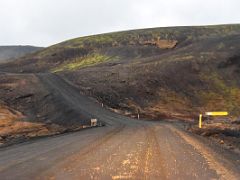 01B We drove south over a small hill on road 42 from Reykjavik passing the junction with road 428 with green moss covered lava Reykjanes Peninsula Iceland