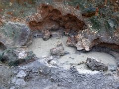 05B A bubbling mud pot with green and red deposits at Seltun Krysuvík geothermal area Reykjanes Peninsula Iceland