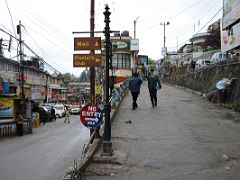04B Street Scene In Chauk Bazaar With Signs To The Mall And Planters Club Darjeeling Near Sikkim India