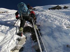 04C Lal Sing Tamang Climbs A Small Rock Band On The Fixed Ropes On The Climb To The Island Peak Summit