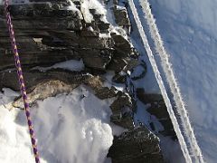 04D Climbing A Small Rock Band On The Fixed Ropes On The Climb To The Island Peak Summit