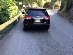 01C The road then starts to climb thru many switch-backs on our way to Blue Mountains near Kingston Jamaica