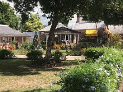 16 The old stables, kitchens and other buildings have been converted into fine restaurants, confectioneries and souvenir shops Devon House mansion Kingston Jamaica