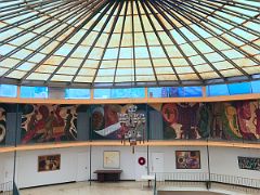 08A Paintings fill the upper gallery wall beneath the domed roof Olympia Gallery The Art Centre Kingston Jamaica