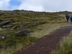 03A Hiking Up The Raised Metal Mesh Path On The Way To The First Pass Near Beginning Of Mount Kosciuszko Australia Hike