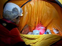 10 Guide Lal Sing Tamang melts snow to start our early morning breakfast at Lobuche East High Camp 5600m