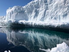 04C An Iceberg Is Reflected In The Sea Water On Day 4 Of Floe Edge Adventure Nunavut Canada