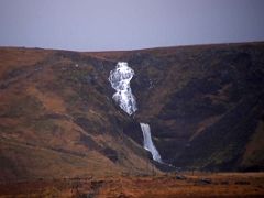 05A Kerlingarfoss waterfall from road 574 as we drive near Rif on the north coast of Snaefellsnes Peninsula Iceland