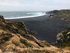 07B Djupalonssandur beach is an arched-shaped bay of dark cliffs and black sand from Utsyni view point in Snaefellsjokull National Park Snaefellsnes Peninsula Iceland