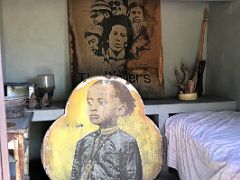 06A The small concrete bedroom with a single bed on which Bob and Rita Marley slept Trench Town Culture Yard Kingston Jamaica