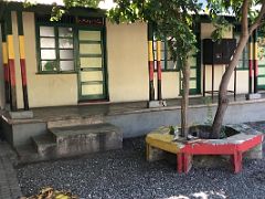 07A The concrete dwellings were built around a common courtyard with shared kitchen and bathroom facilities Trench Town Culture Yard Kingston Jamaica