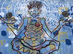 04D Colourful mural of a man sitting cross-legged meditating inside the abandoned warehouse, the home of Paint Jamaica street art in Kingston Jamaica