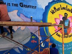 14A Street artists at work on Barry St We must love each other and support each other Paint Jamaica Barry St street art in Kingston Jamaica