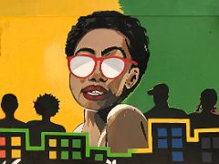 13B We Are Jamaicans - bold, colourful, and confident mural close up by Deon Simone Water Lane Street Art Kingston Jamaica