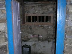 Kangchenjunga 09 04 Yamphudin House Toilet So, how do they do their, you know ...? Here is the toilet at Yamphudin. It's a porcelain set of feet with a chute. Although it is initially hard on our Western&hellip;