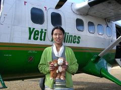 Kangchenjunga 10 04 Yeti Airlines Stewardess at Suketar Danger Dangles and the Zig-Zagger being held by a nice friendly young stewardess in front of Yeti Airlines at the airport in Suketar. Now, we thought that the&hellip;