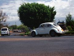 06A Entering Moshi Tanzania With Kilimanjaro Kili Just Visible On The Way To Climb Mount Kilimanjaro