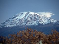02B A Cloud Trails Off The Mount Kilimanjaro Kili Summit In The Pre-Dawn Light From Moshi Tanzania YMCA Pool On The Way To Climb Kili Kilimanjaro