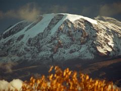 03C Clouds Dissipate As The Sun Starts To Shine On Mount Kilimanjaro Kili From Moshi Tanzania YMCA On The Way To Climb Mount Kilimanjaro Kili