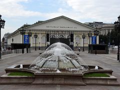 03A A fountain with Moscow Manege, an oblong building erected from 1817-25 by architect Joseph Bove Manezhnaya Square Moscow Russia